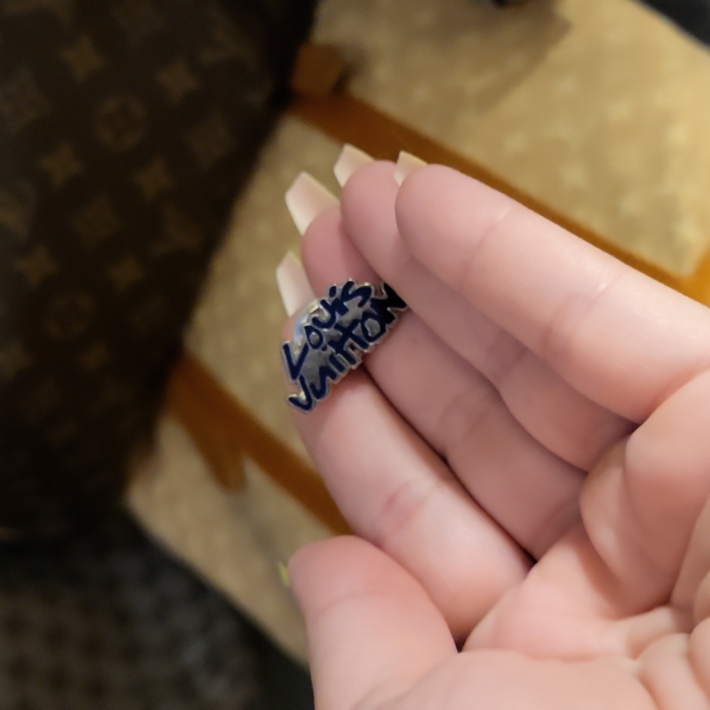 Authentic Louis Vuitton pin.
